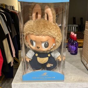 Adorable Plush Toy with Brown and Gray Outfit